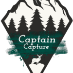 Logo from Captain Capture showing trees in a mountain Surrounding.