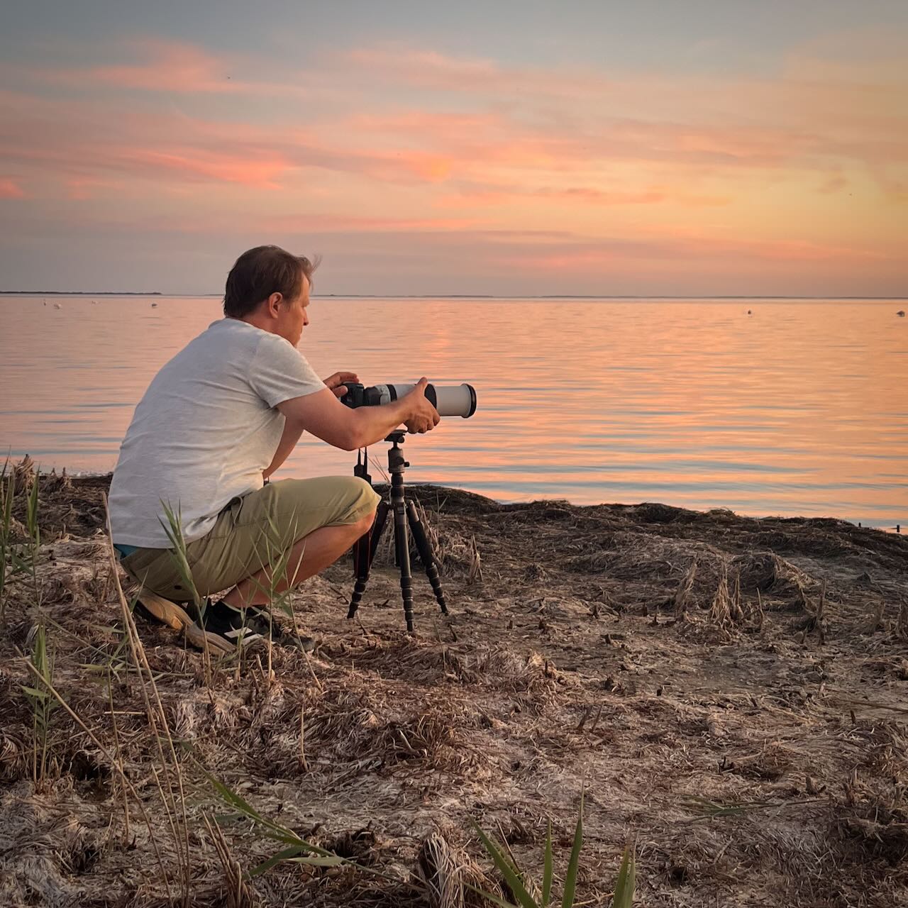 Photographer sitting at a saltlake in france region camargue after taking some incredible wildlife